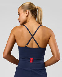 Woman wearing Tia-Clair Toomey-Orr Legacy 3" Run One-Piece - Future Navy | Model:Taneisha | Size:XS | Thumbnail Index: 7
