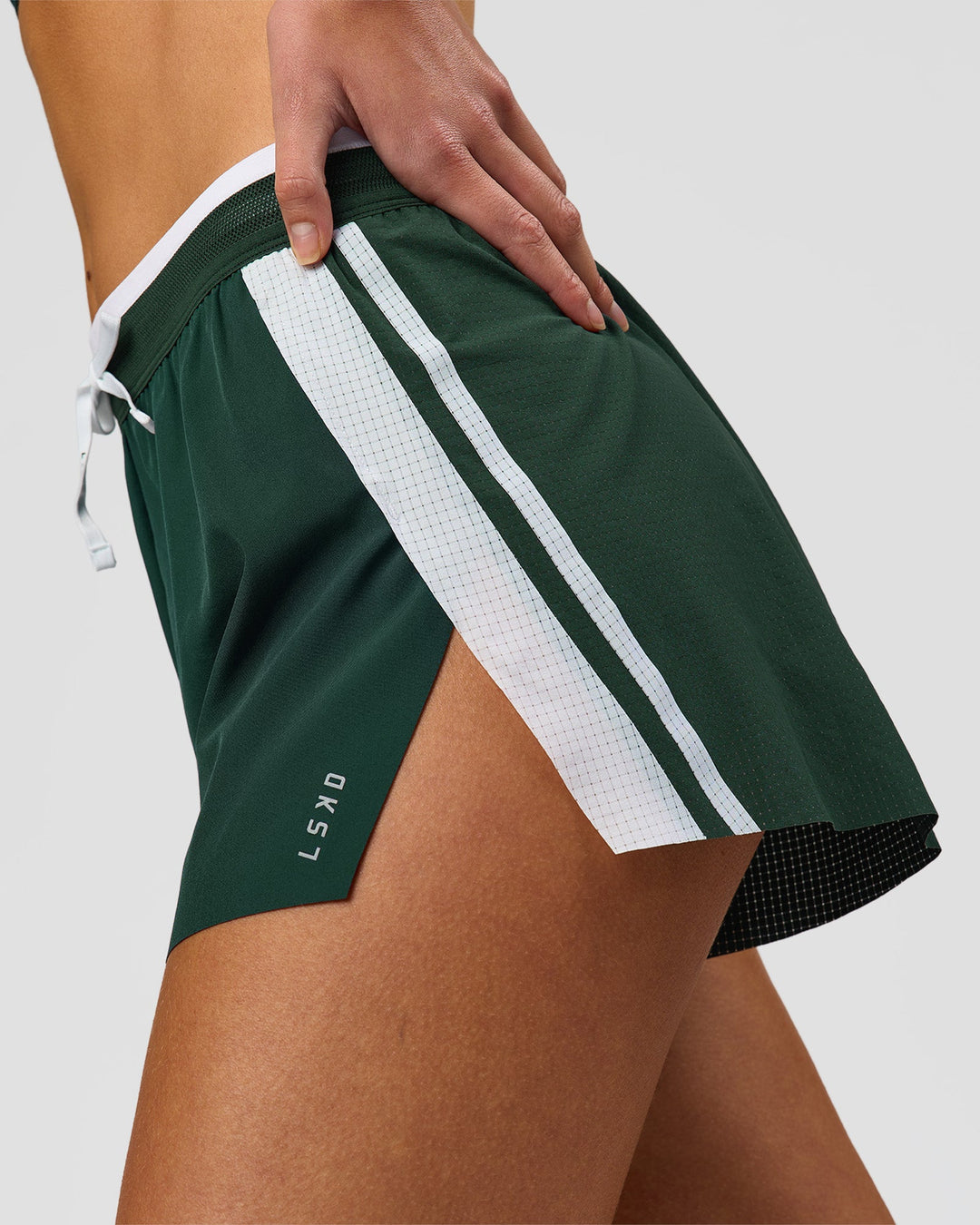 Woman wearing Trackline Accelerate 3" High-Rise Running Short - Midnight Green-White | Model:Taneisha | Size:XS - view 2