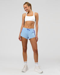 Woman wearing Velocity Sports Bra - White | Model:Taneisha | Size:XS | Thumbnail Index: 3