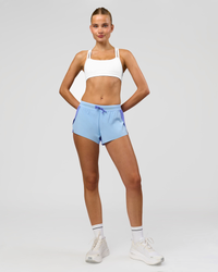 Woman wearing Velocity Sports Bra - White | Model:Taneisha | Size:XS | Thumbnail Index: 5
