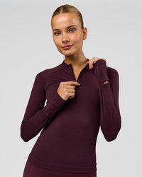 Woman wearing AeroFLX+ Long Sleeve Half Zip - Cherry Lacquer/Cherry Laquer | Model:Taniesha | Size:XS | Thumbnail Index: 0