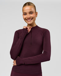 Woman wearing AeroFLX+ Long Sleeve Half Zip - Cherry Lacquer/Cherry Laquer | Model:Taniesha | Size:XS | Thumbnail Index: 4