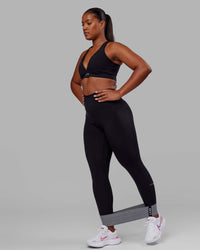 Woman wearing O.G. Fusion Ultra High-Rise Full Length Legging Pockets - Black | Model:Krystal | Size:L