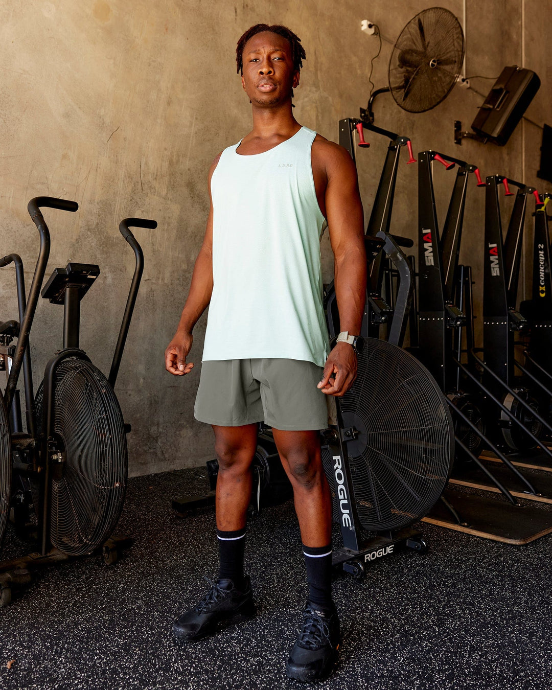 Man wearing Challenger 6" Lined Performance Short - Graphite