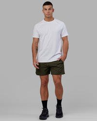 Man wearing Challenger 6" Performance Short - Forest Night