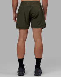 Man wearing Challenger 6" Performance Short - Forest Night