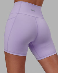 Woman wearing Fusion Ultra High-Rise 6" Short Pockets - Pale Lilac | Model:Milly | Size:S