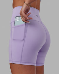 Woman wearing Fusion Ultra High-Rise 6" Short Pockets - Pale Lilac | Model:Milly | Size:S