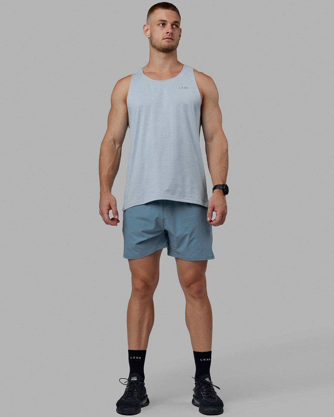 Man wearing Challenger 6&quot; Performance Shorts - Elemental Blue