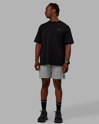 Man wearing Rep 7'' Performance Shorts - Ultimate Grey