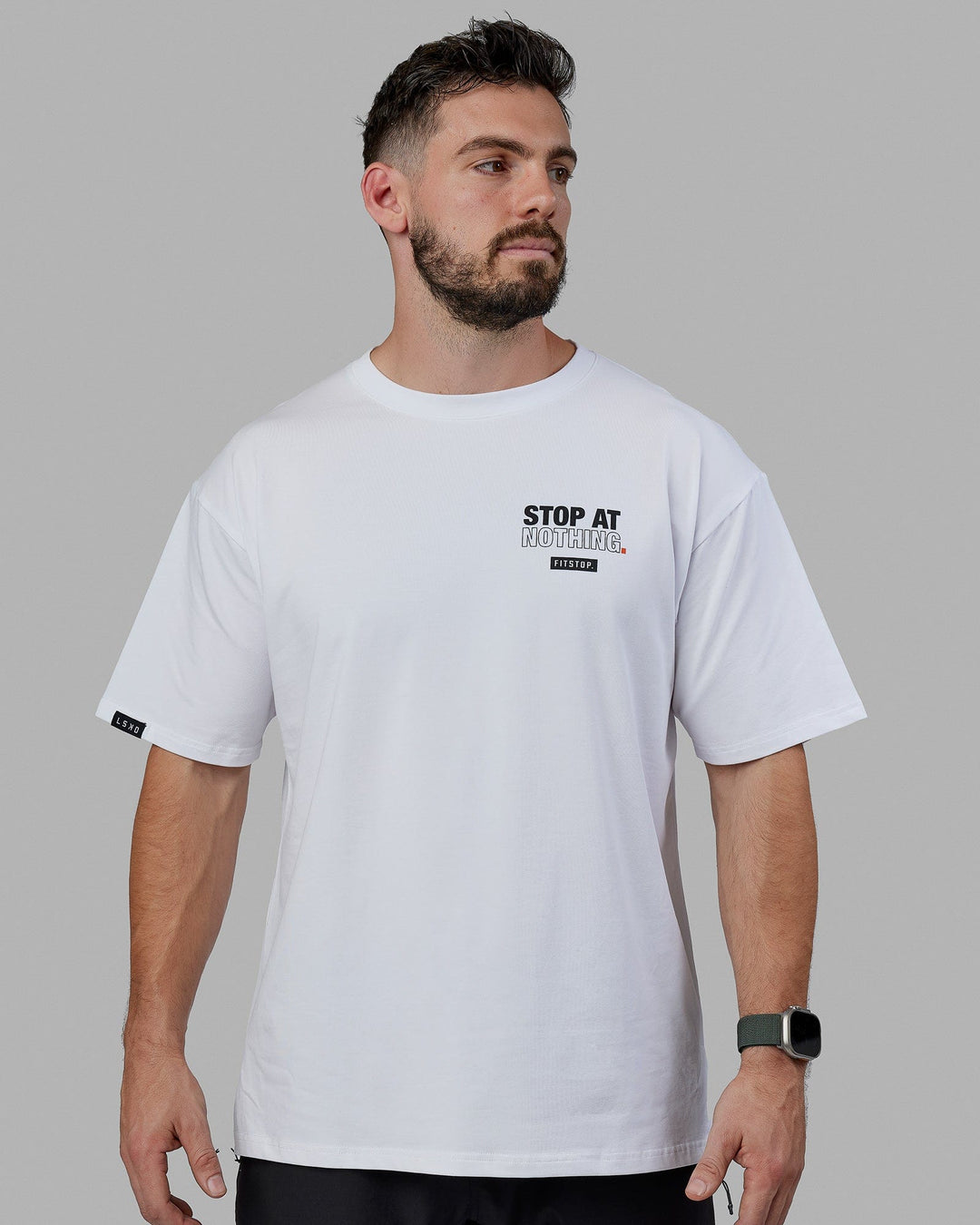 Man Wearing Unisex Fitstop Stop at Nothing Tee Oversize - White-Black