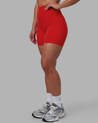 Woman wearing Fusion Ultra High-Rise 6" Short Pockets - Infrared | Model:Annabelle | Size:S