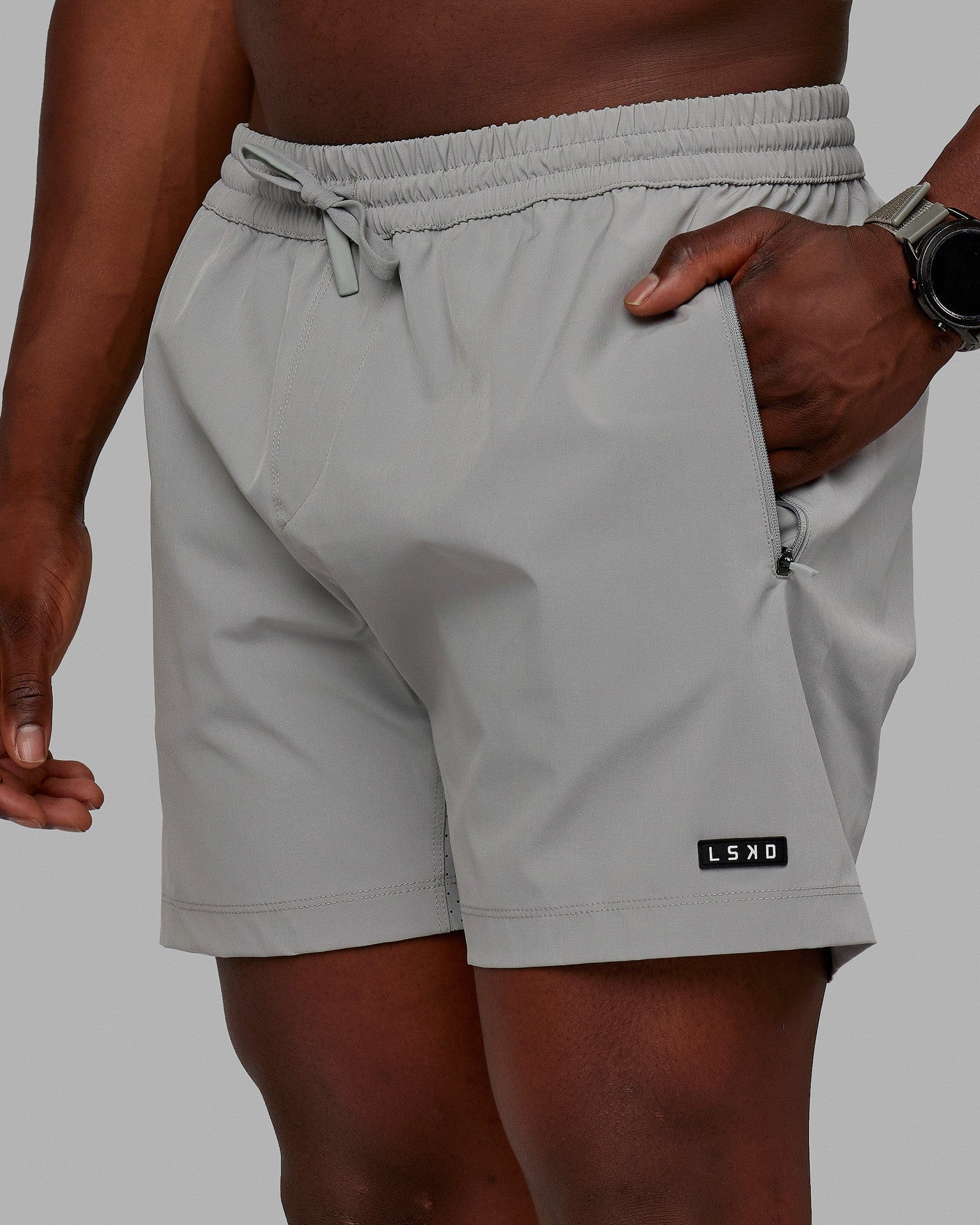 Man wearing Rep 5'' Performance Shorts - Ultimate Grey