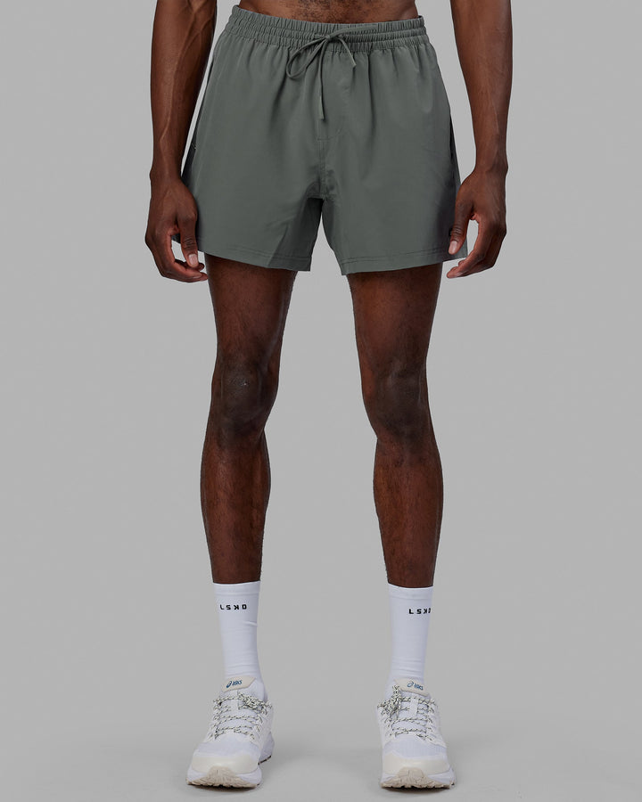 Man wearing Rep 5'' Performance Short - Graphite