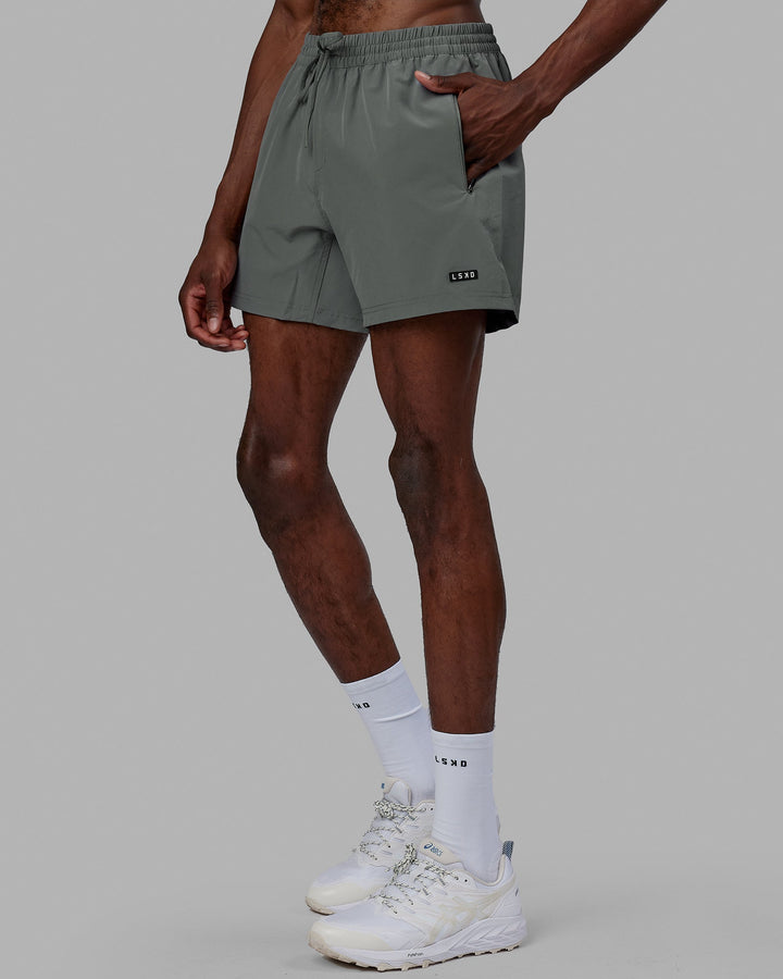 Man wearing Rep 5'' Performance Short - Graphite