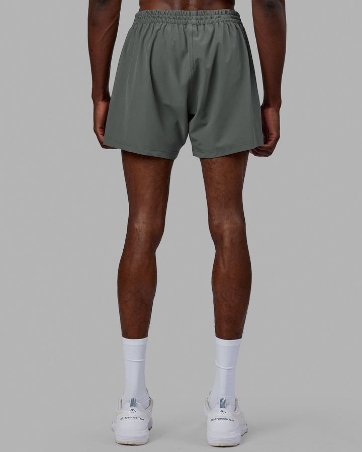 Man wearing Rep 5'' Performance Short - Graphite