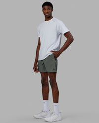 Man wearing Rep 7'' Performance Short - Graphite