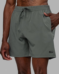 Man wearing Rep 7'' Performance Short - Graphite