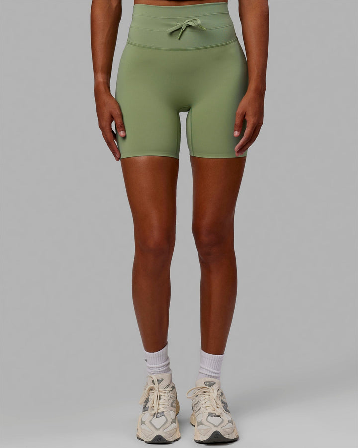 Woman wearing Resistance Mid-Length Shorts - Bayleaf
