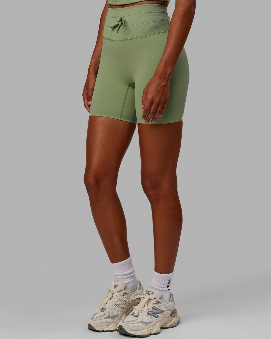 Woman wearing Resistance Mid-Length Shorts - Bayleaf