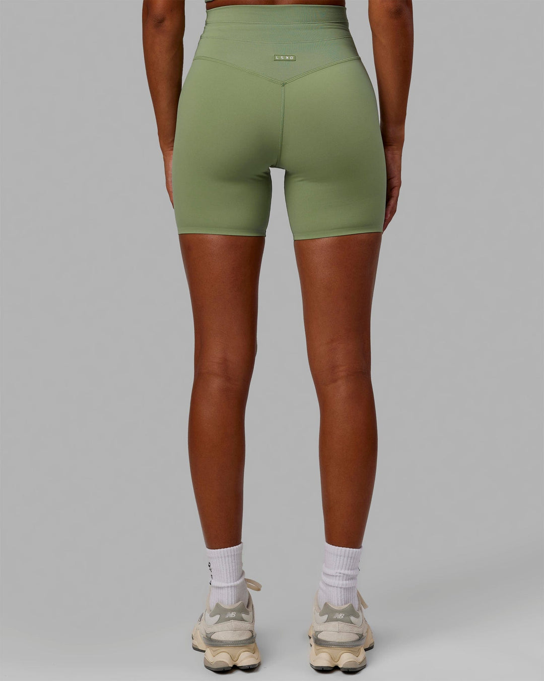 Woman wearing Resistance Mid-Length Shorts - Bayleaf