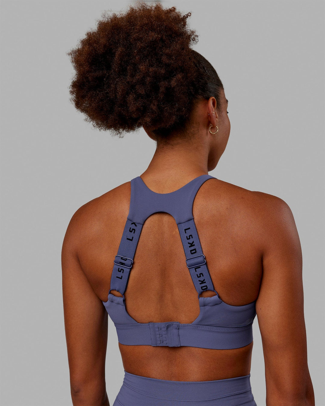 Woman wearing Resistance Ribbed Sports Bra - Future Dusk