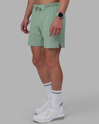 Man wearing UltraAir 6'' Lined Performance Short - Iceberg Green