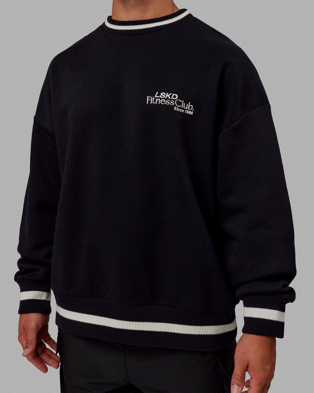 Man wearing Unisex Fitness Club Sweater Oversize - Black-Off White