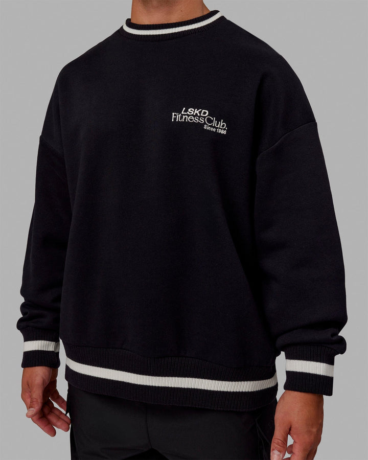 Man wearing Unisex Fitness Club Sweater Oversize - Black-Off White
