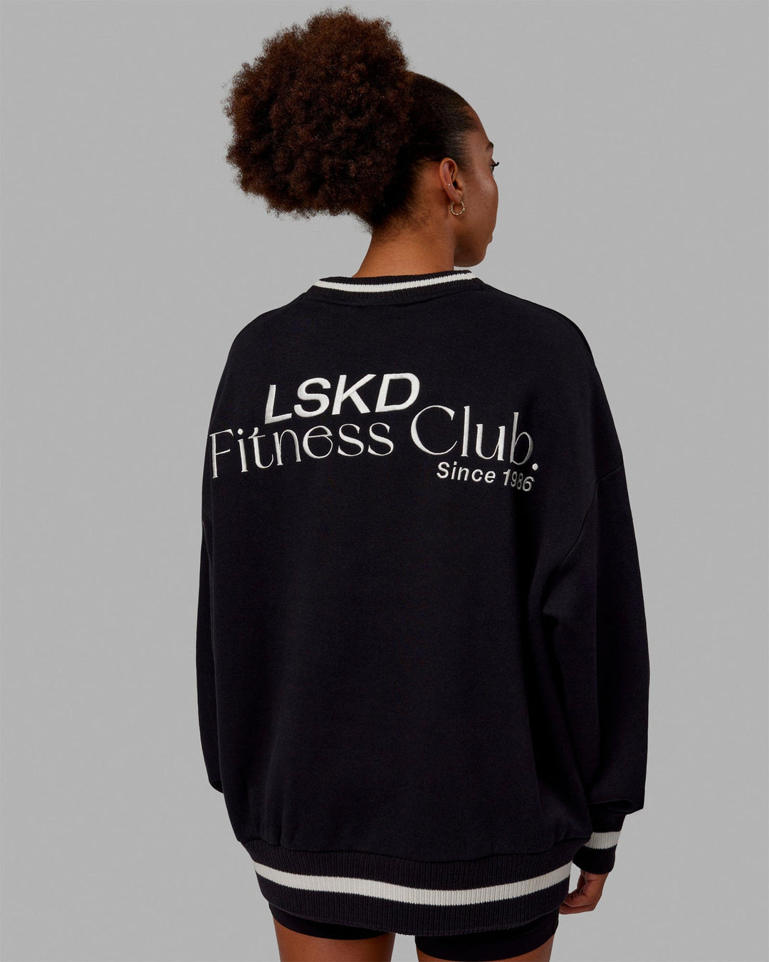 Woman wearing Unisex Fitness Club Sweater Oversize - Black-Off White