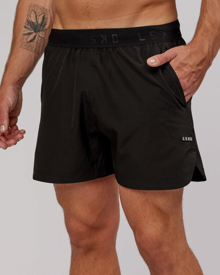 Man wearing Competition 5" Performance Short - Black