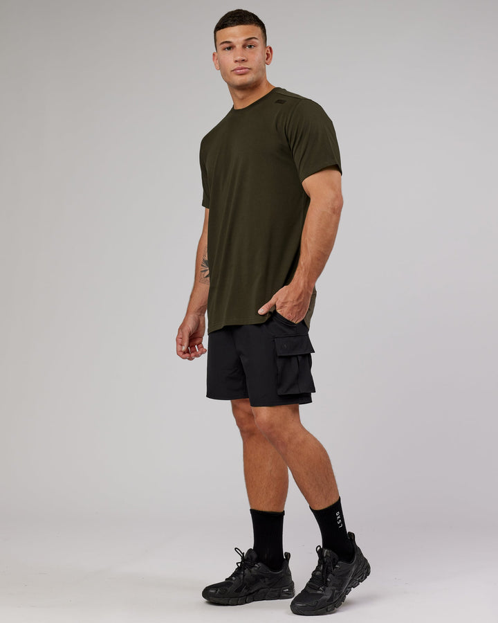 Man wearing Energy Stretch Performance Cargo Short - Black
