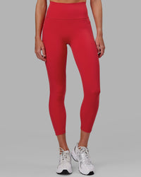 Woman wearing Fusion Ultra High-Rise 7/8 Legging Pockets - Scarlet | Model:Elise | Size:S