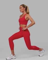 Woman wearing Fusion Ultra High-Rise 7/8 Legging Pockets - Scarlet | Model:Elise | Size:S