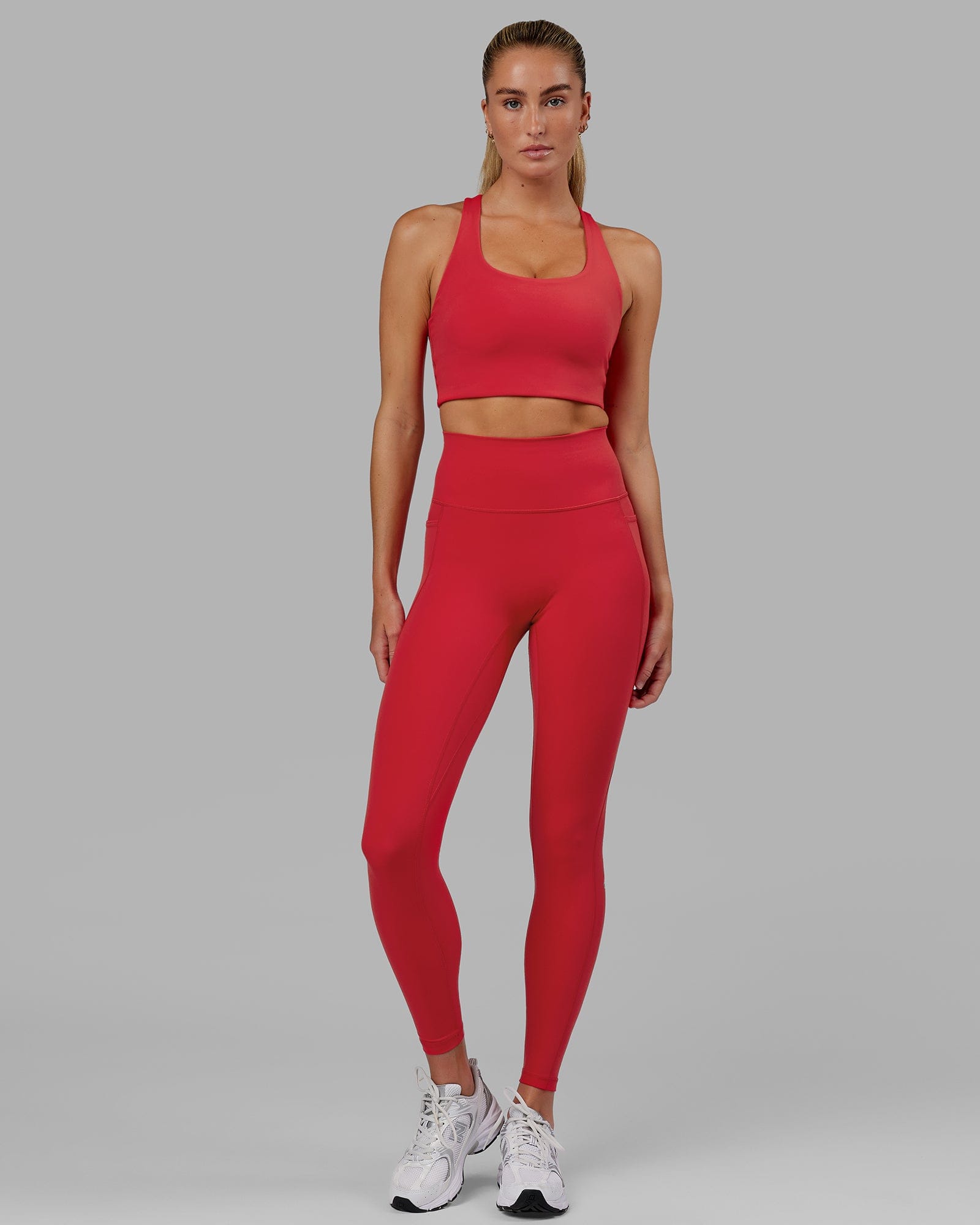 Woman wearing Fusion Ultra High-Rise Full Length Legging Pockets - Scarlet | Model:Elise | Size:S