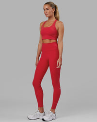 Woman wearing Fusion Ultra High-Rise Full Length Legging Pockets - Scarlet | Model:Elise | Size:S