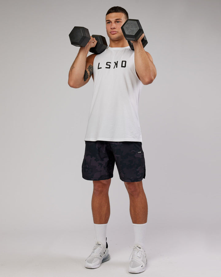 Man wearing Competition 8" Performance Short - Black Camo