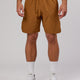 Man wearing Competition 8" Performance Short - Camel