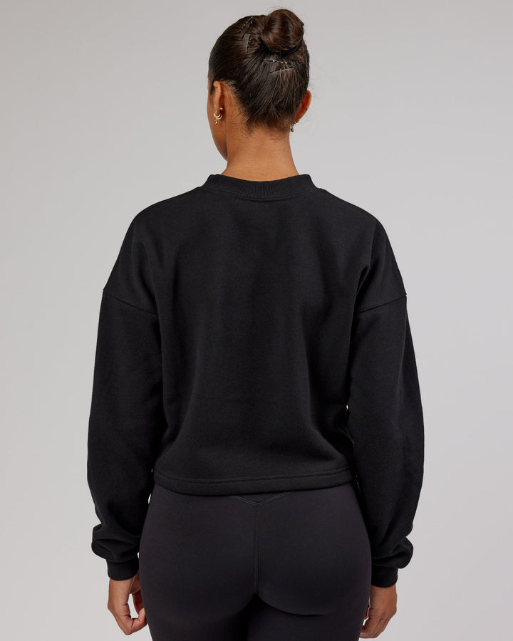 Woman wearing Touchdown Sweater - Black